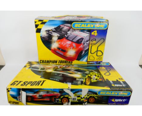 Scalextric - Two boxed Scalextric sets. Lot consists of a 'Champion Tourers' set with a Vauxhall Astra and Mercedes CLK; plus