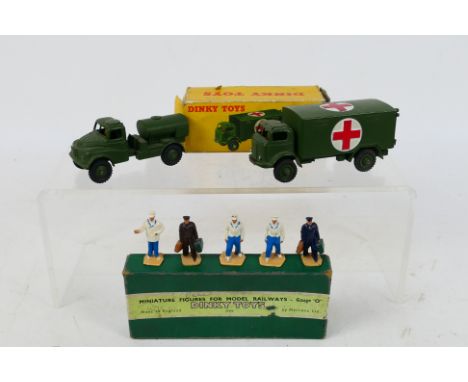 Dinky - A boxed set of 5 Train and Hotel Staff set # 5, a boxed Military Ambulance # 626, an unboxed Austin water tanker # 64