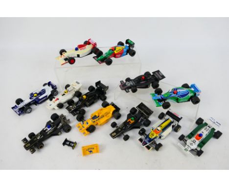 Scalextric - A collection of 14 unboxed playworn Scalextric Formula 1 / Formula 2 slot cars. Lot includes Williams Honda FW11