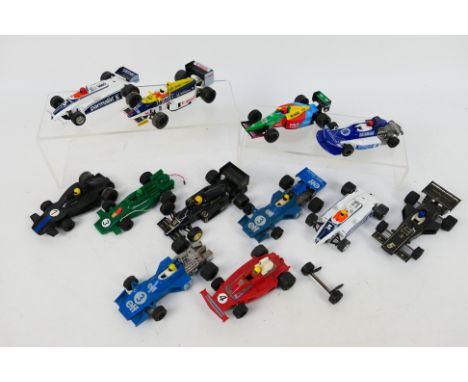 Scalextric - 12 unboxed playworn Scalextric Formula 1 / Formula 2 slot cars. Lot includes Tyrrell 007; William Honda FW11; Be