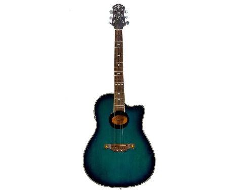 Crafter FSG-250E electro-acoustic guitar. Bowl back model with a piezo pickup, Finish: transparent aqua blue, made in Korea, 