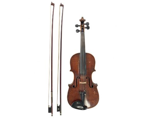 An early 20th century violin. Having a maple back in two pieces, ebony fingerboard and pegs, back measure 35cm (excluding but