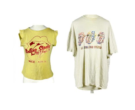 The Rolling Stones. Two vintage T-shirts.  An original 'Tour of Europe' 1976 vest, Nice, June the 13th, yellow with a flocked