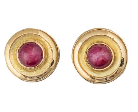 Circa 1980 A pair of 18 carat gold and cabochon ruby cufflinks and buttons suite Hallmarked Sheffield 1986  Weight:Â&nbsp; 27