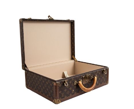 Property of a Gentleman  Louis Vuitton A small monogram canvas trunk With brass fittings, leather top handle, black dust bag,