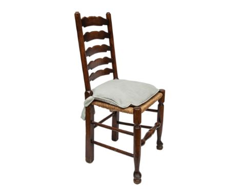 A suite of ten ladder back chairs, caned with squabs, including two carvers  Property of a Gentleman  Dimensions: 38.5 in. (H