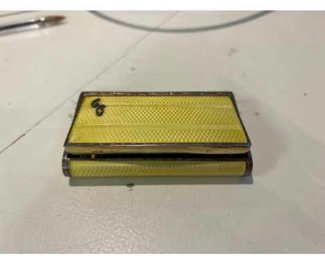 Early 20th Century A Dunhill guilloche enamel snuff box covered in a canary yellow enamel  Property of a Lady  Dimensions: 3 