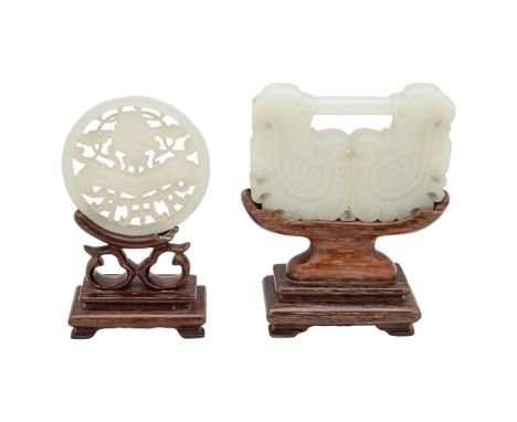 China Early 20th Century A pair of carved jade/jadeite items [a] A Chinese whitish Jade plaque with stand [b] A Chinese pale 