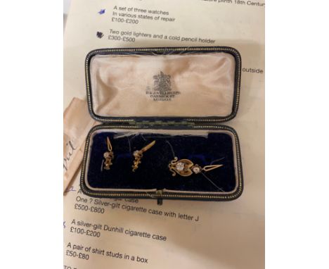 To be sold without reserve Property of a Gentleman  Late 19th Century A set of tie pins With diamonds In an embossed leather 