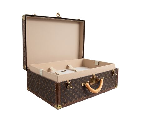 Property of a Gentleman  Louis Vuitton A medium monogram canvas trunk With brass fittings, cream leather divider inserts, lea