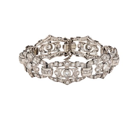 Art Deco A diamond and platinum bracelet Comprising seven architectural style panels with larger central brilliant cut diamon