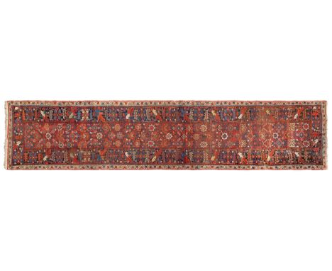 Circa 1900-1920 A long runner with floral and geometric designs  Dimensions:  197 in. (L) x 45.5 in. (W)