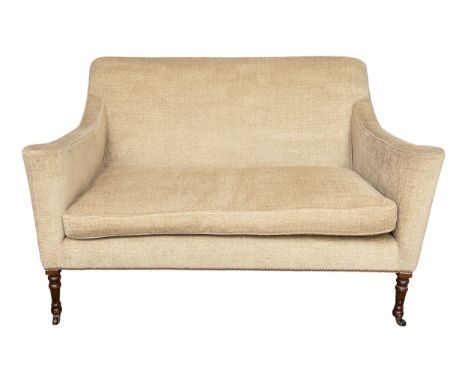 19th Century (?) A two-person sofa on carved, turned oak legs with brass casters  Property of a Gentleman  Dimensions: 36 in.