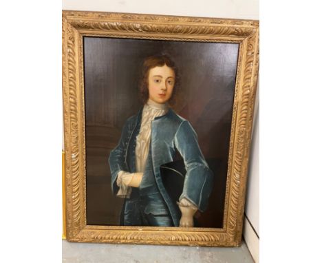 18th Century British School A portrait of a young gentleman in blue silk frock coat Oil on canvas Signed (?) lower left, 'J. 