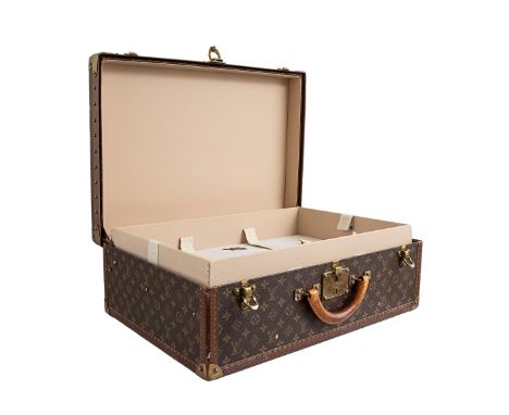 Property of a Gentleman  Louis Vuitton A medium monogram canvas trunk With brass fittings, cream leather divider insert, leat