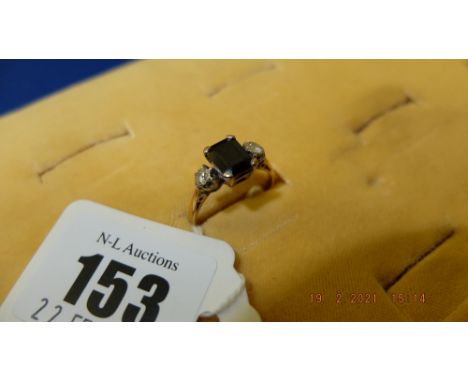 A Diamond and Sapphire cluster ring, mounted in an 18ct Gold and Platinum, 3 grams