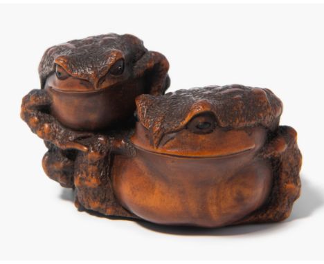 Holz-Netsuke von Suzuki Masanao (1815-1890)Japan, 2.Hälfte 19.Jh. Holz. Signiert Masanao. Zwei Kröten. Die Kleinere sitzt auf