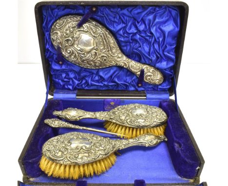 CASED SILVER DRESSING TABLE SET 1x Mirror, 2 x brushes, together with a button hook.Sold as seen.