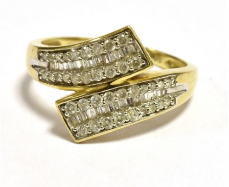 TJC 9CT GOLD DIAMOND CROSSOVER RING Ring size O 3/4, Weight 2.7g Condition Report : Mixed cut melee diamonds on a yellow gold