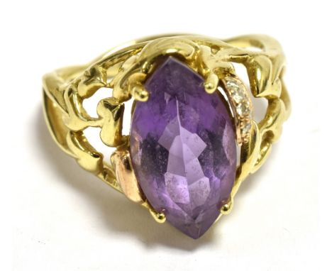 CLOGAU; 9CT GOLD AMETHYST , COCKTAIL RING. (BOXED) Diamond accent detail to tree of life open work shoulders. Navette cut ame