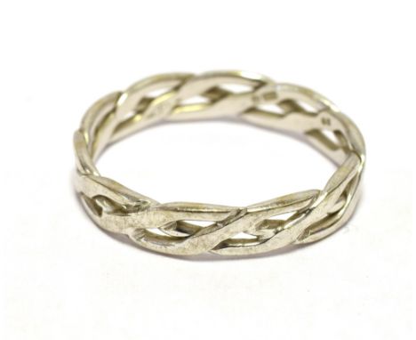 CELTIC BAND RING In a white metal stamped 750, ring size M1/2, weight 2.7g