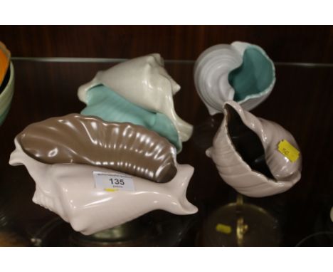 FOUR POOLE POTTERY CERAMIC SHELL ORNAMENTS