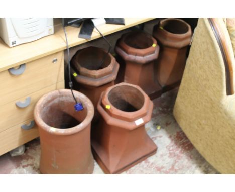 A QUANTITY OF CERAMIC CHIMNEY POTS