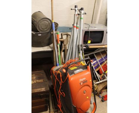 A FLYMO ELECTRIC MOWER TOGETHER WITH A QUANTITY OF GARDENING TOOLS ETC.