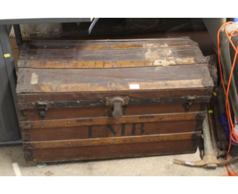 A VINTAGE TRAVEL TRUNK