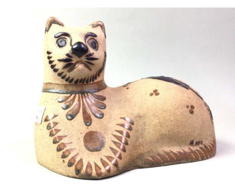 ART POTTERY FIGURE OF A RECUMBENT CAT, ALONG WITH FURTHER ITEMS the cat signed 'MB MET', the other items comprising a mantel 