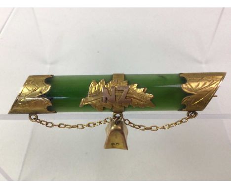 NEW ZEALAND JADE BAR BROOCH, with yellow metal mounts, along with a nine carat gold 'BABY' bar brooch and a swivel fob