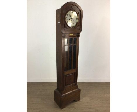ART DECO OAK LONGCASE CLOCK, CIRCA 1920s the circular face with Arabic numerals180cm highNo weights or key present with this 
