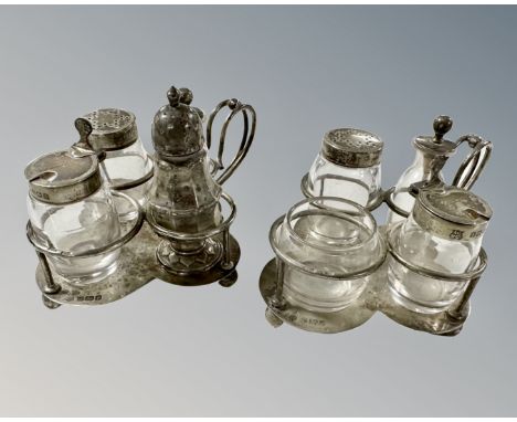 A pair of Edwardian silver cruets, The Alexander Clark Manufacturing Co, Sheffield 1906, each containing four various silver 