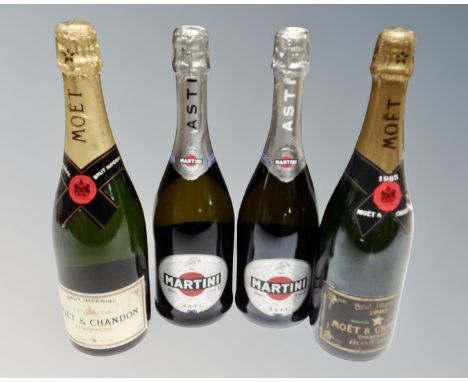 Two bottles of Moet and Chandon Brut Imperial champagne, each 75cl, together with two bottles of Martini Asti sparkling wine,