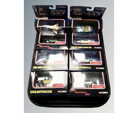Eight Corgi James Bond die cast vehicles, boxed.