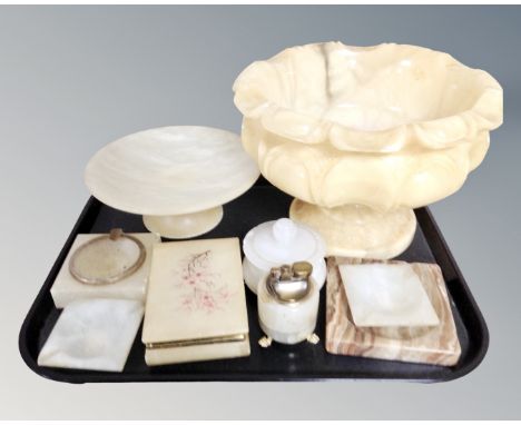 A tray of alabaster and onyx ornaments including pedestal fruit bowl, table lighter, trinket box etc 