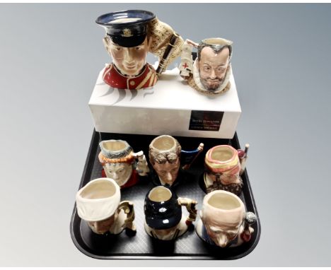 A group of eight Royal Doulton character jugs including North Staffordshire Fife player, King Philip II of Spain, Cricketers 