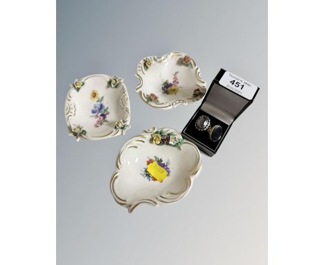 Three hand painted Dresden porcelain dishes together with two silver dress rings.