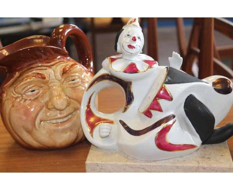LUA NOVA CERAMIC CLOWN ON COMPOSITE BASE
together with a royal doulton toby jug and a coalport bird figure