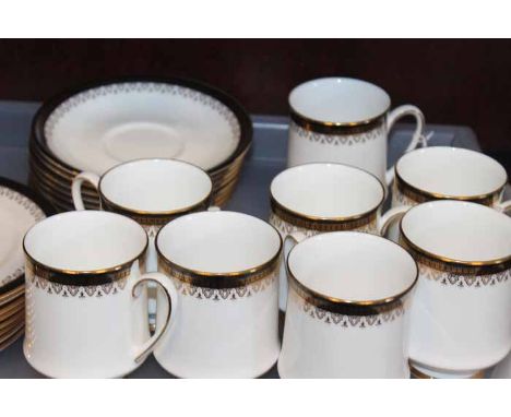 ATTRACTIVE ROYAL PENDANT BONE CHINA TEA SERVICE
decorated with gilt floral flags, with turquoise and orange highlights on a c