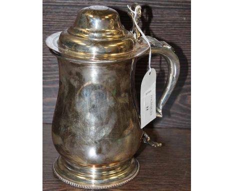 SILVER PLATED TANKARD SET WITH GEORGE II SILVER SHILLING
shilling set in the top of the lid, 20cm high