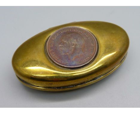 A brass Welsh miner's tobacco box, marked made in Wales 