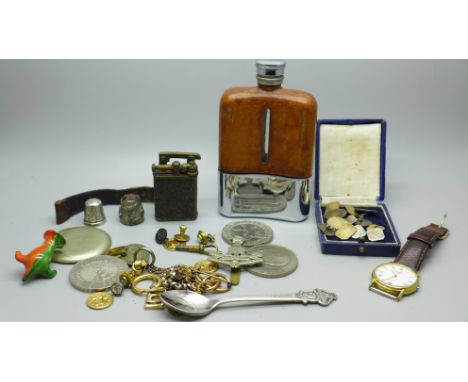 A hip flask, crowns, watch badges, etc. 