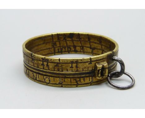 An early brass sun dial ring, 38mm diameter 