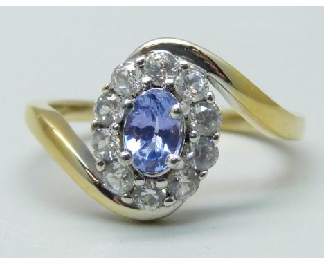A silver gilt, tanzanite and zircon cluster ring, O 