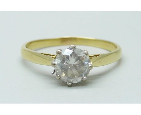 An 18ct gold and diamond solitaire ring, round brilliant cut diamond, claw set in white gold with open tube shoulders, 1.14ct