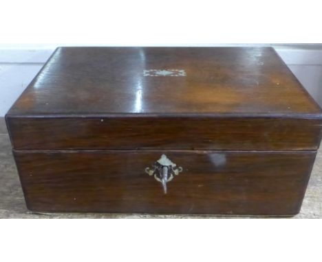 A wooden box with mother of pearl inlay, two lighters, metalware and a safety razor 