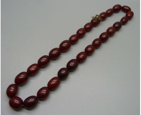 A vintage red bead necklace 