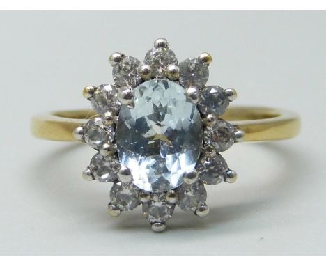 A silver gilt, aquamarine and zircon cluster ring, P 