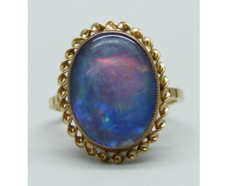 A 9ct gold and doublet opal ring, 3.2g, O 